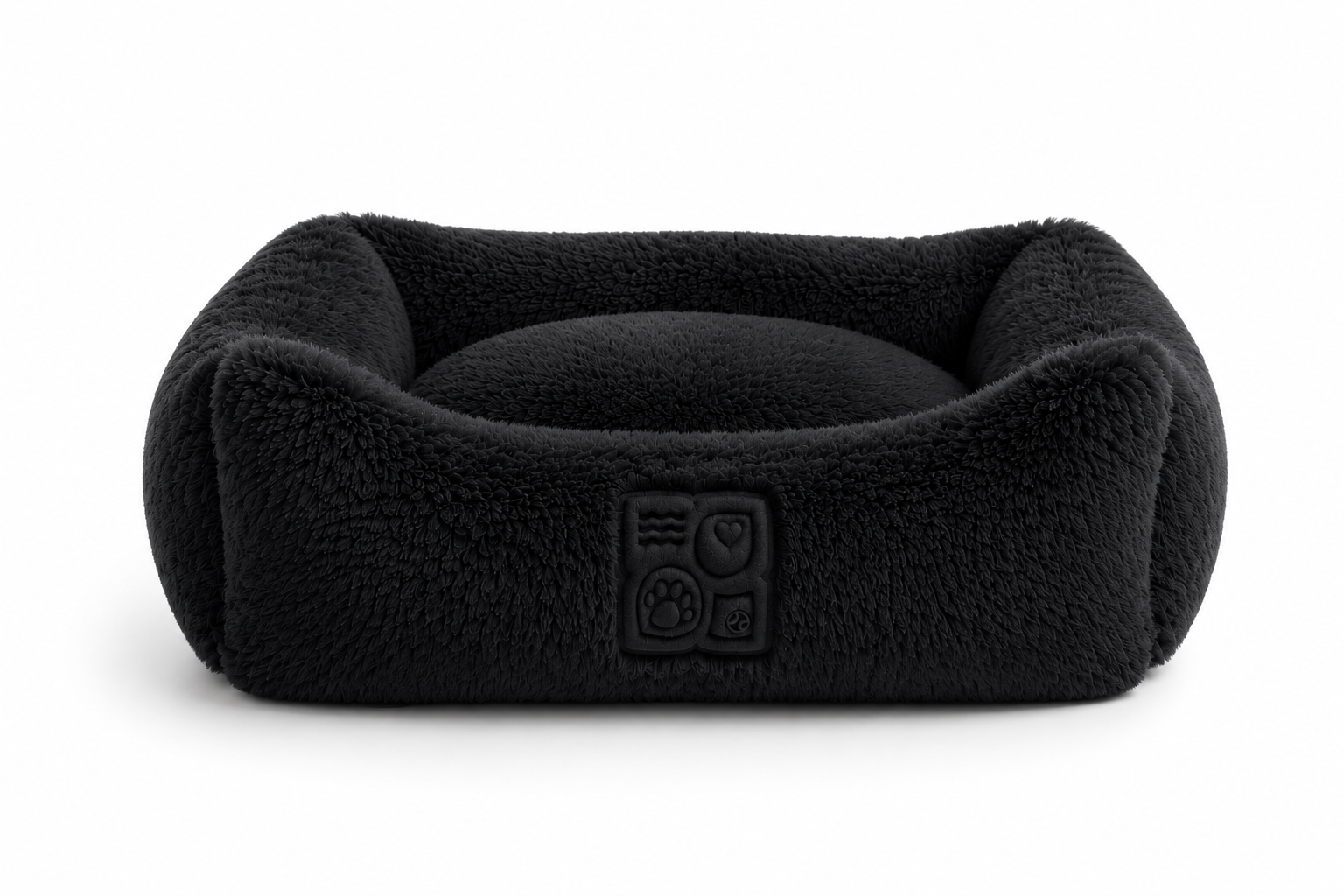 A black, fleece pet bed with a raised edge and cushion on a plain white background
